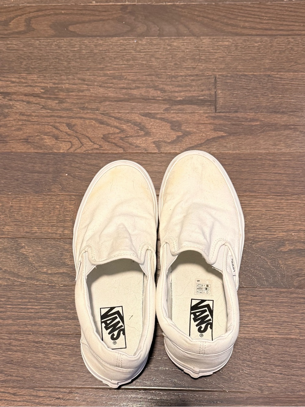 Vans Slip-On Canvas Sneakers in White